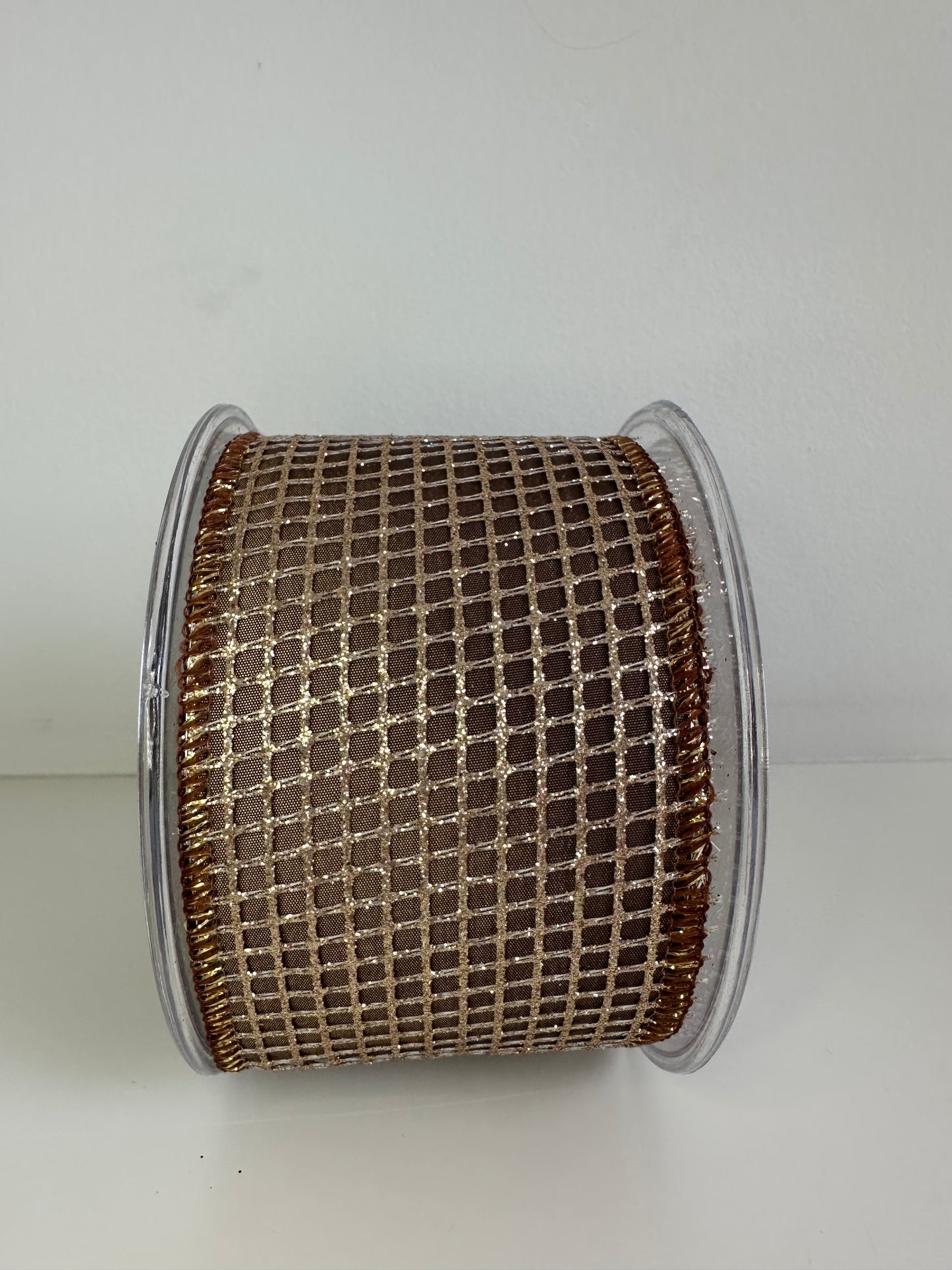 bronzen lint met gouden rooster