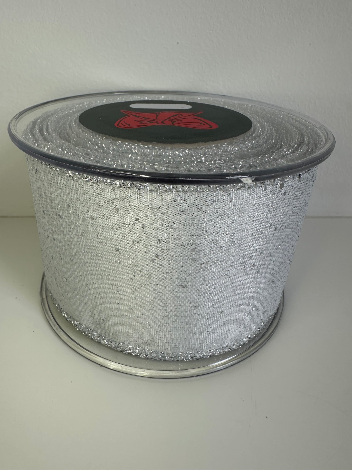 Wit blinkend lint met zilveren glitters