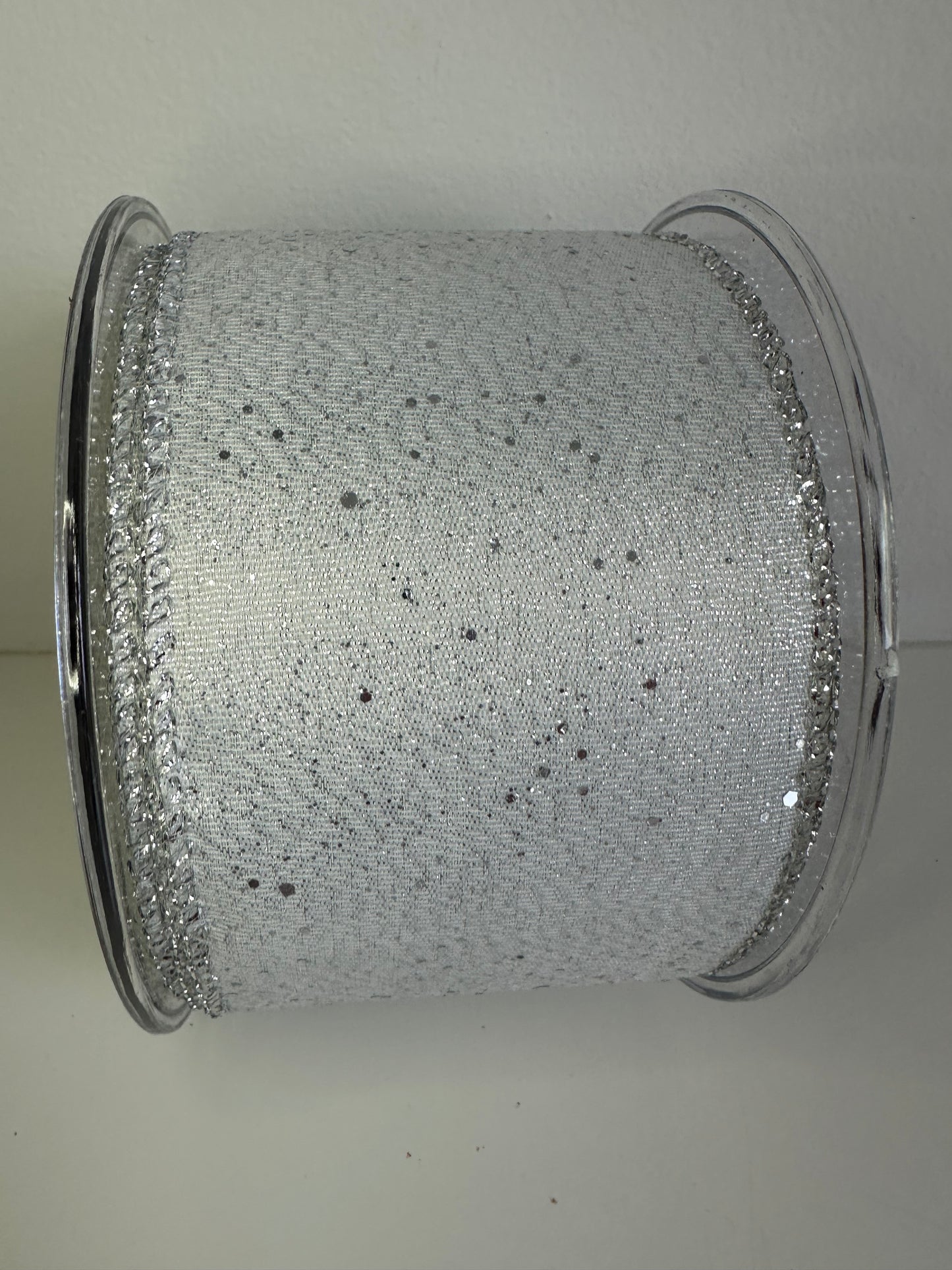 Wit blinkend lint met zilveren glitters