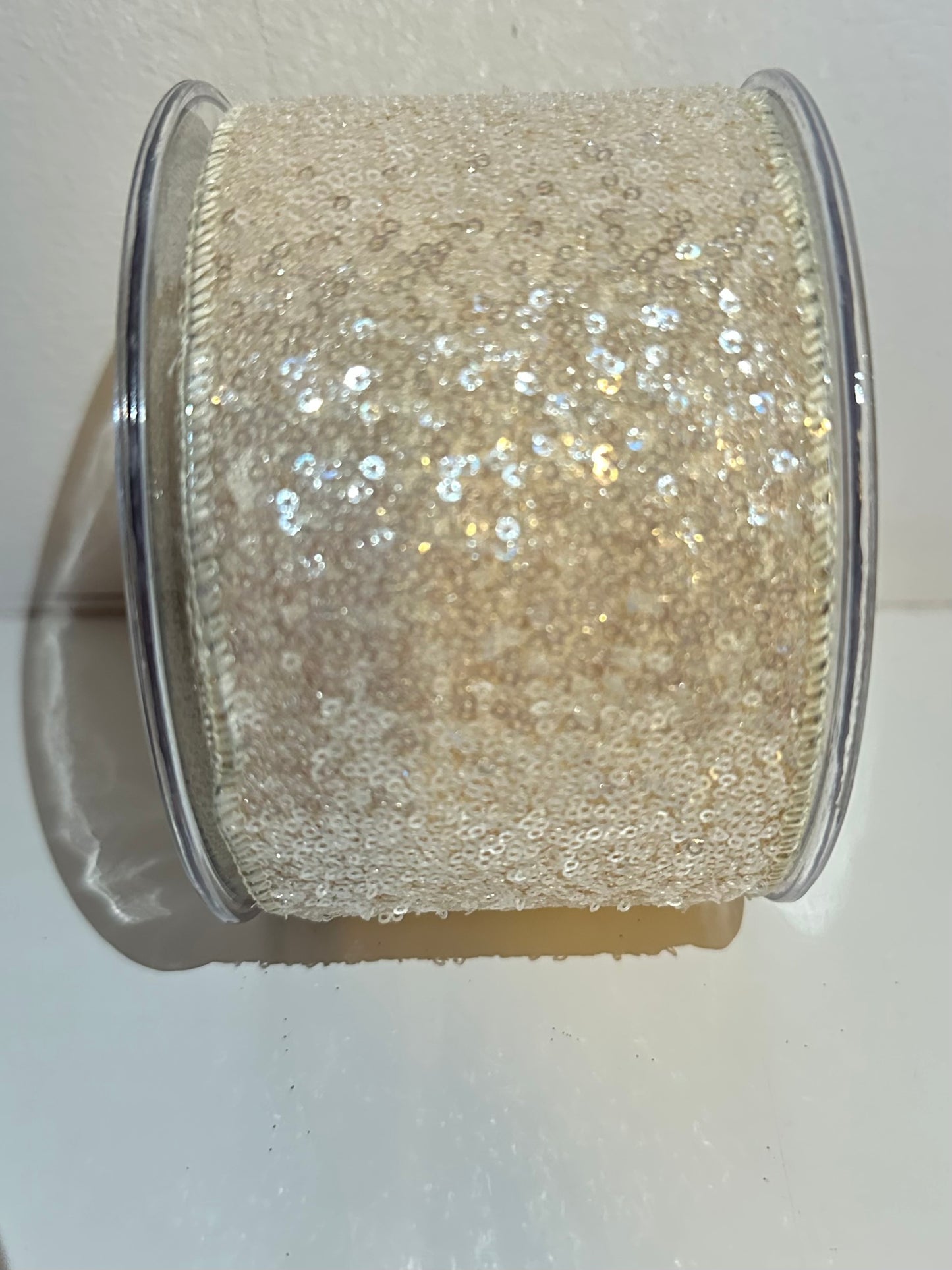 Champagne lint met pailleten
